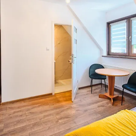 Quarto em Acomodações Particulares Julia Łeba